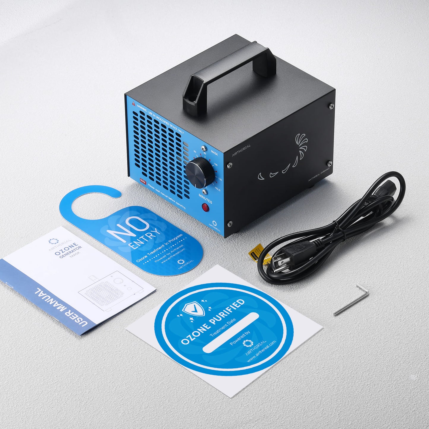 Ozone generator with accessories on a light gray background