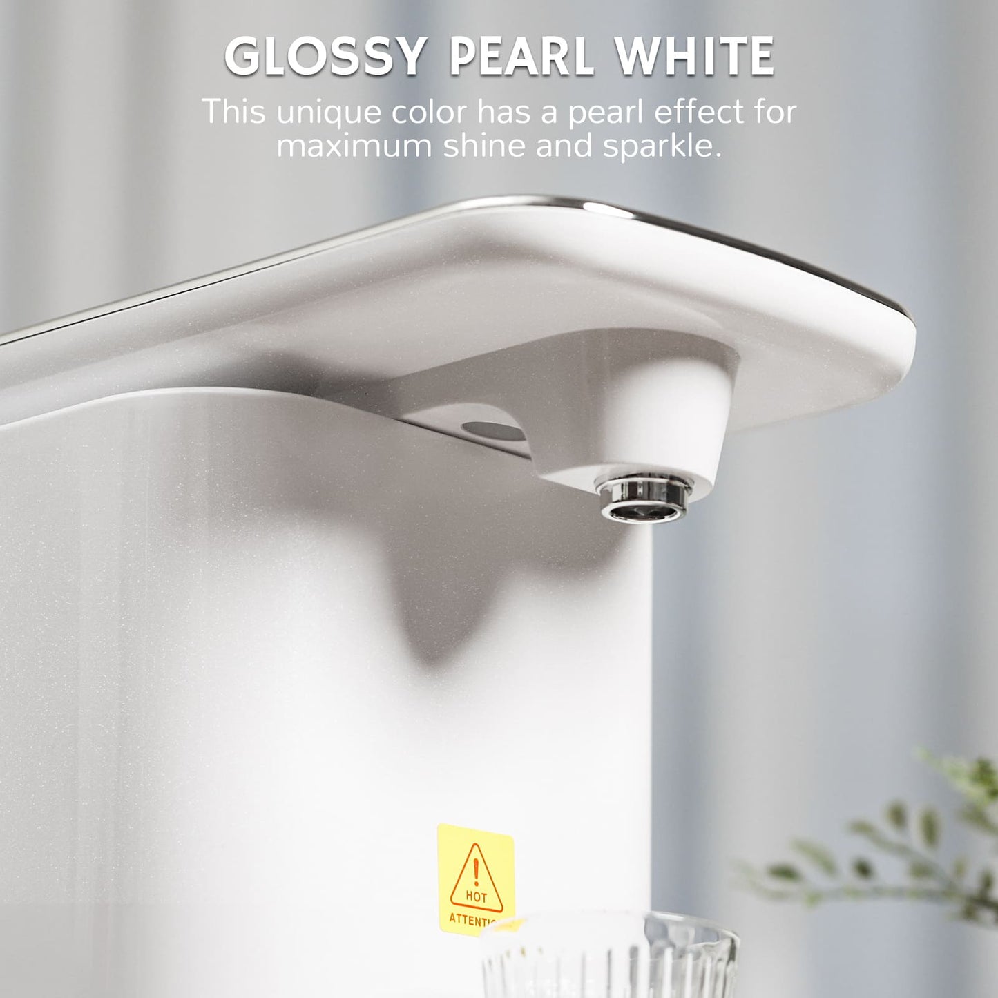 Countertop water dispenser with touch controls, dispensing water into a clear cup.