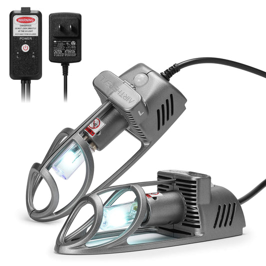 Electronic device with two lights and power adapter on a white background