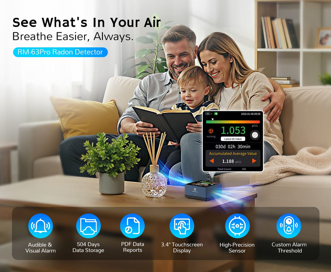 Family sitting on a sofa, reading together with a radon detector displaying air quality data on a table.