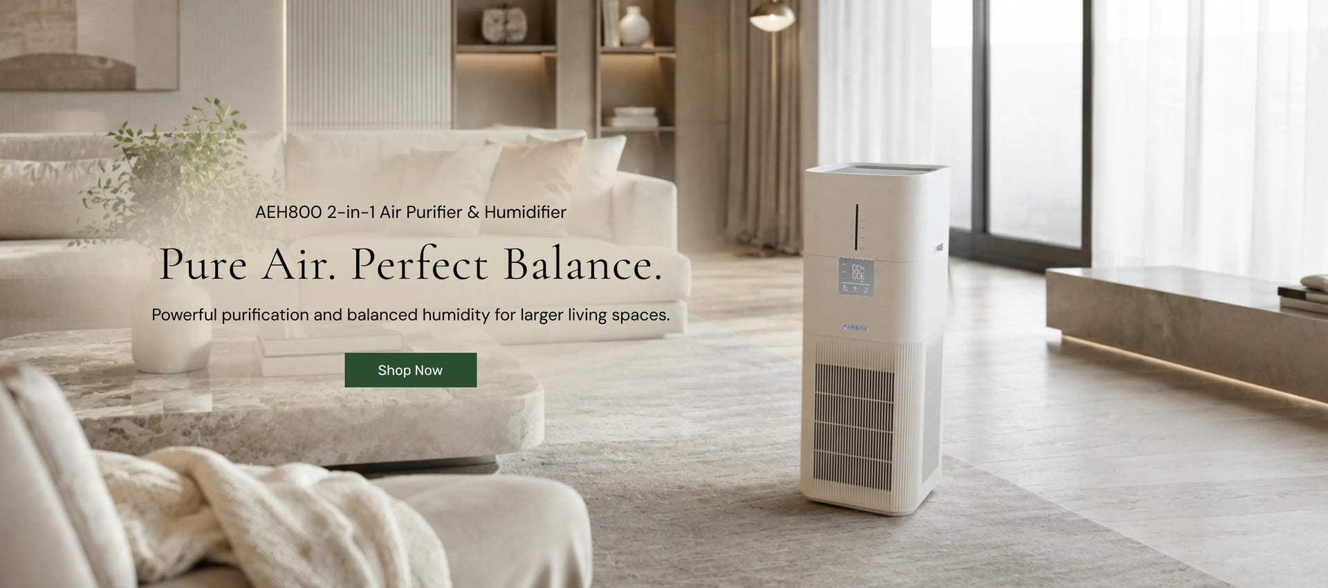A tall white portable air purifier and humidifier stands on a light wood floor in a modern, sunlit living room. Text on the image reads 'Pure Air.