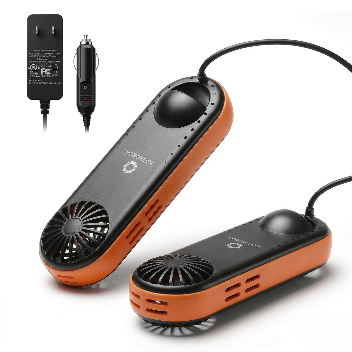 Two orange and black shoe dryers with a power adapter on a white background